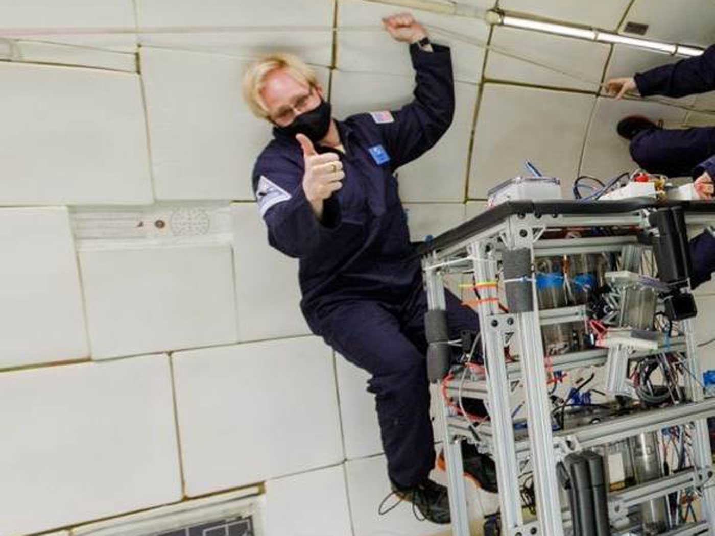 Jared-long-fox-web man floating in space inside spaceship